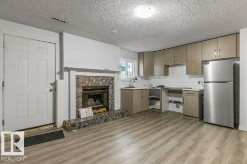 3132 49A Street, Edmonton, AB - Indoor With Fireplace