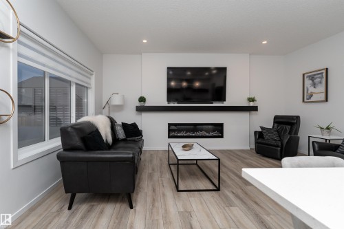17450 80 Street, Edmonton, AB - Indoor Photo Showing Living Room With Fireplace
