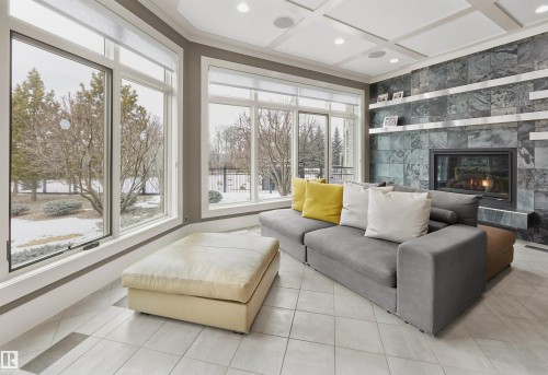 16 Windermere Drive, Edmonton, AB - Indoor Photo Showing Other Room With Fireplace