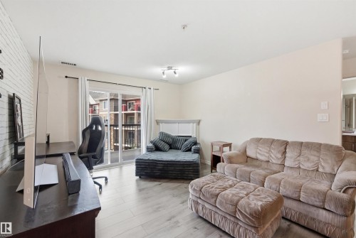 352 2096 Blackmud Creek Drive, Edmonton, AB - Indoor Photo Showing Living Room