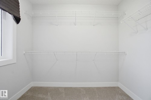 with a window - 18 4835 Wright Drive, Edmonton, AB - Indoor With Storage