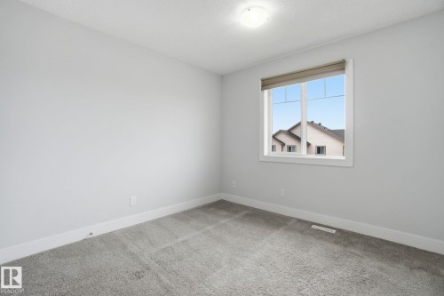#2 - 18 4835 Wright Drive, Edmonton, AB - Indoor Photo Showing Other Room
