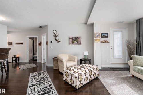 224 5151 Windermere Boulevard, Edmonton, AB - Indoor Photo Showing Living Room