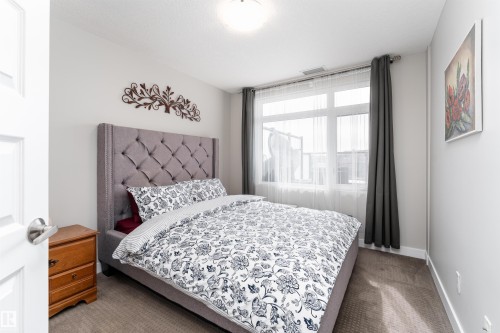 224 5151 Windermere Boulevard, Edmonton, AB - Indoor Photo Showing Bedroom