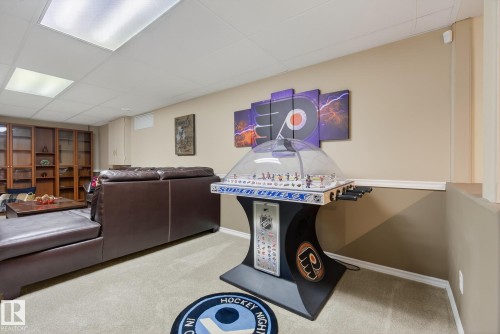 Recreation room featuring carpeted flooring, neutral-toned walls, and recessed lighting - 17204 113 Street, Edmonton, AB - Indoor