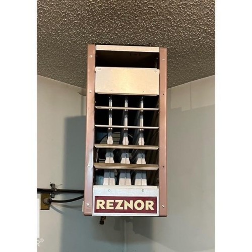 Reznor brand heater mounted on a wall - 17204 113 Street, Edmonton, AB - Indoor