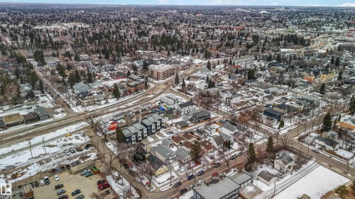 Aerial view showcasing the property's location within a developed neighborhood, featuring residential homes and green spaces - 10186 143 Street, Edmonton, AB - Outdoor With View