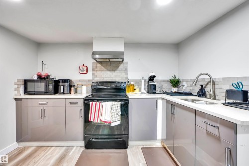 2743 Collins Crescent, Edmonton, AB - Indoor Photo Showing Kitchen With Double Sink