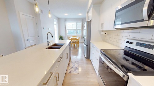 2093 Maple Road, Edmonton, AB - Indoor Photo Showing Kitchen With Double Sink With Upgraded Kitchen