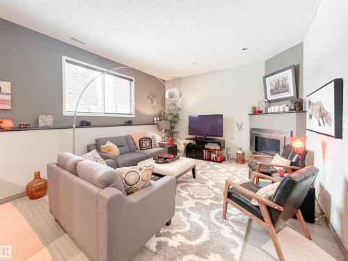 9 Deslauriers Crescent, St. Albert, AB - Indoor Photo Showing Living Room With Fireplace