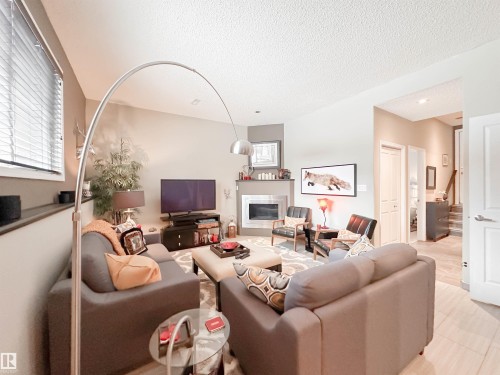 9 Deslauriers Crescent, St. Albert, AB - Indoor Photo Showing Living Room With Fireplace
