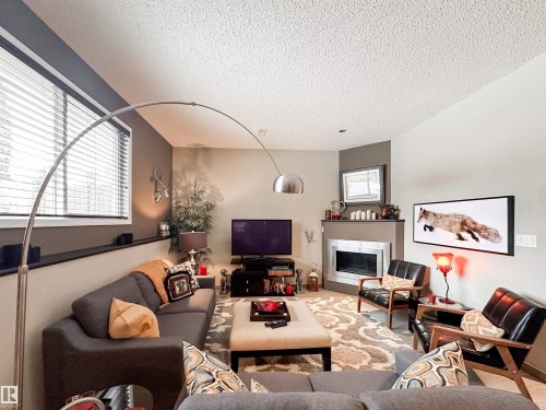9 Deslauriers Crescent, St. Albert, AB - Indoor Photo Showing Living Room With Fireplace