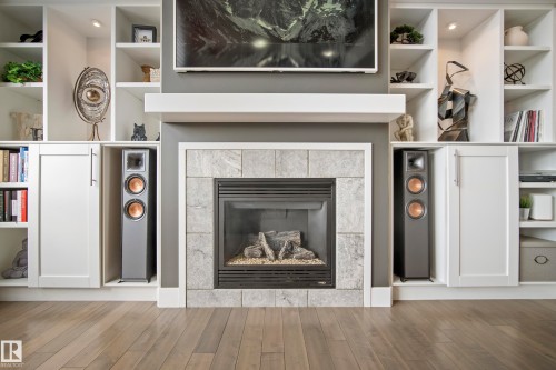 10720 65 Street, Edmonton, AB - Indoor Photo Showing Living Room With Fireplace