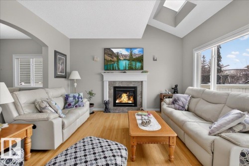 942 Chahley Crescent, Edmonton, AB - Indoor Photo Showing Living Room With Fireplace