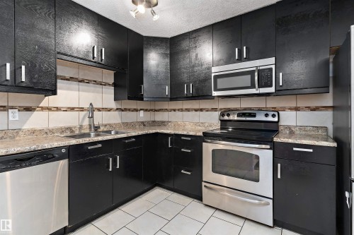 196 Roseland Village, Edmonton, AB - Indoor Photo Showing Kitchen With Double Sink