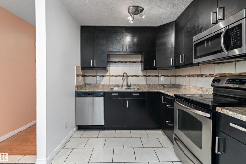 196 Roseland Village, Edmonton, AB - Indoor Photo Showing Kitchen With Double Sink