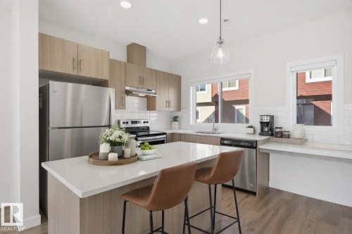 Virtually staged - 85 1010 Rabbit Hill Road, Edmonton, AB - Indoor Photo Showing Kitchen With Upgraded Kitchen