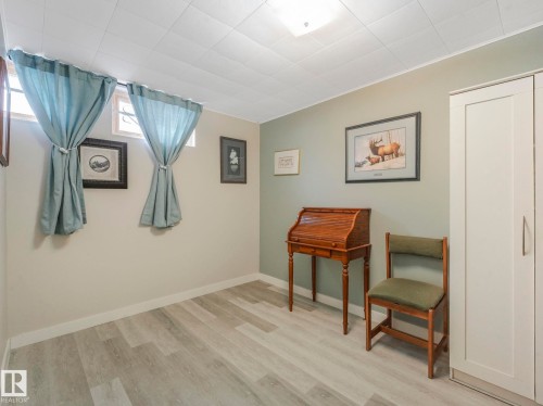This room features light-toned flooring, light-colored walls, and a lighter-toned ceiling - 16106 79A Avenue Nw, Edmonton, AB - Indoor