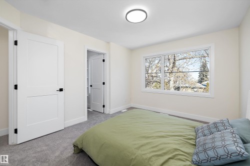 13'4"x10'9" - 8319 81Ave, Edmonton, AB - Indoor Photo Showing Bedroom