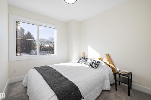 Bedroom 3 - 8319 81Ave, Edmonton, AB - Indoor Photo Showing Bedroom