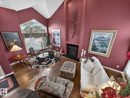 116 Twin Brooks Cove, Edmonton, AB - Indoor Photo Showing Living Room With Fireplace