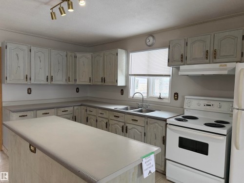 4847 50 Avenue, Sangudo, AB - Indoor Photo Showing Kitchen With Double Sink