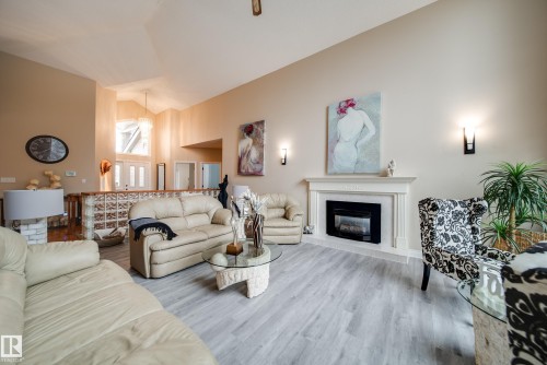 242 Running Creek Lane, Edmonton, AB - Indoor Photo Showing Living Room With Fireplace