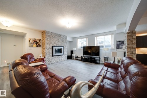 242 Running Creek Lane, Edmonton, AB - Indoor Photo Showing Living Room With Fireplace
