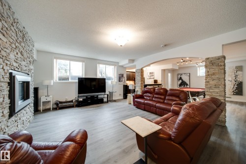242 Running Creek Lane, Edmonton, AB - Indoor Photo Showing Living Room With Fireplace