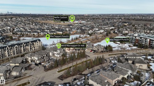 Aerial view of the neighborhood featuring residential properties and tree-lined streets - 4016 Mactaggart Drive, Edmonton, AB - Outdoor With View