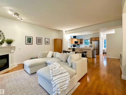 41 903 Rutherford Road, Edmonton, AB - Indoor Photo Showing Living Room With Fireplace