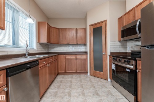 202 9905 81 Avenue, Edmonton, AB - Indoor Photo Showing Kitchen With Double Sink