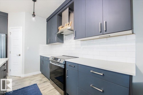 1035 Berg Place, Leduc, AB - Indoor Photo Showing Kitchen