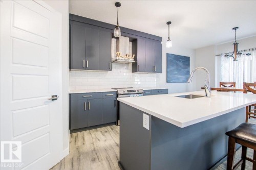 1035 Berg Place, Leduc, AB - Indoor Photo Showing Kitchen With Upgraded Kitchen
