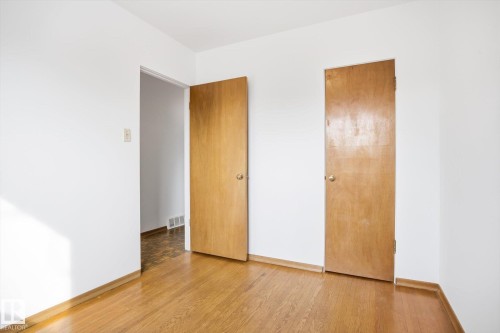 The room features hardwood flooring and white walls - 6503 106A Avenue, Edmonton, AB - Indoor Photo Showing Other Room