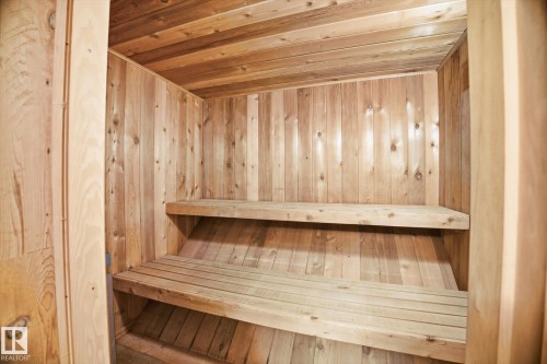 This property features a dedicated space with light wood paneling throughout, including the walls and ceiling - 6503 106A Avenue, Edmonton, AB - Indoor Photo Showing Other Room