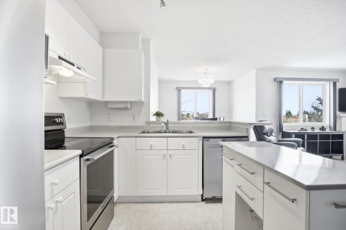 306 5116 49 Avenue, Leduc, AB - Indoor Photo Showing Kitchen With Double Sink