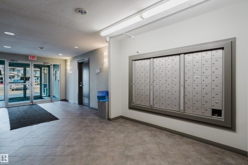 This property features a spacious lobby with tiled flooring - 113 309 Clareview Station Drive, Edmonton, AB - Indoor Photo Showing Other Room