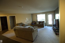 The property features carpeted floors in the main living space - 
