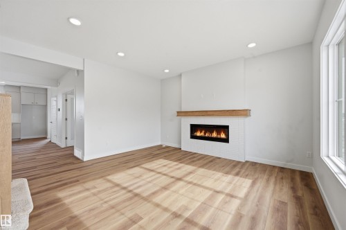 3266 Dallas Schmidt Drive, Edmonton, AB - Indoor Photo Showing Living Room With Fireplace