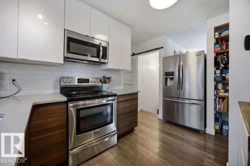 8816 25A Avenue, Edmonton, AB - Indoor Photo Showing Kitchen With Stainless Steel Kitchen With Upgraded Kitchen
