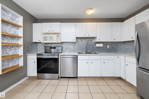 85 Forest Grove, St. Albert, AB - Indoor Photo Showing Kitchen With Double Sink