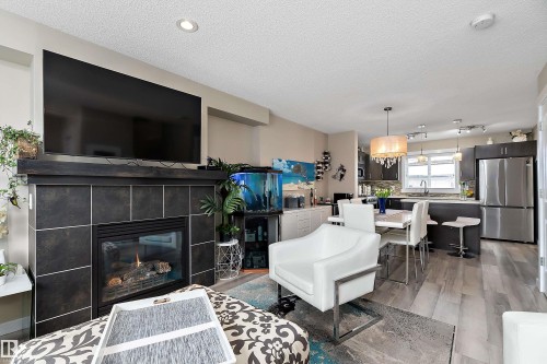 2914 18A Avenue, Edmonton, AB - Indoor Photo Showing Living Room With Fireplace