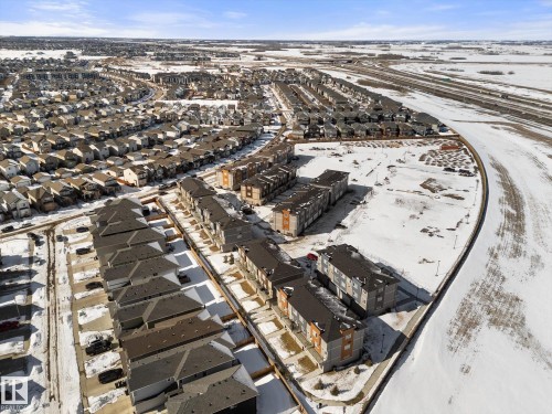 Aerial view showcasing the residential neighborhood with a mix of detached and multi-unit properties - 79 17635 58 Street, Edmonton, AB - Outdoor With View