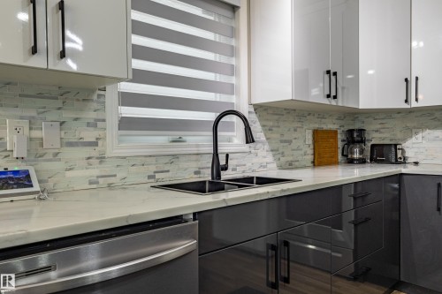 6220 1A Avenue Sw, Edmonton, AB - Indoor Photo Showing Kitchen With Double Sink