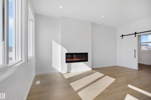 1126 Cristall Crescent, Edmonton, AB - Indoor Photo Showing Living Room With Fireplace