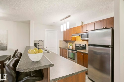 1123 9363 Simpson Drive, Edmonton, AB - Indoor Photo Showing Kitchen With Stainless Steel Kitchen