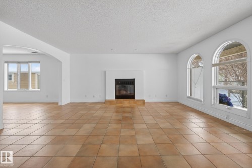 9115 77 Avenue, Edmonton, AB - Indoor Photo Showing Other Room With Fireplace