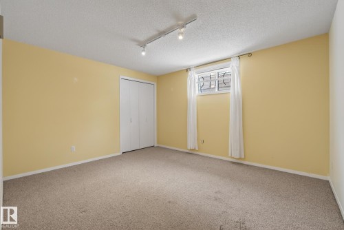 Basement Bedroom - 9115 77 Avenue, Edmonton, AB - Indoor Photo Showing Other Room