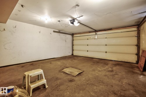 Heated - 9115 77 Avenue, Edmonton, AB - Indoor Photo Showing Garage